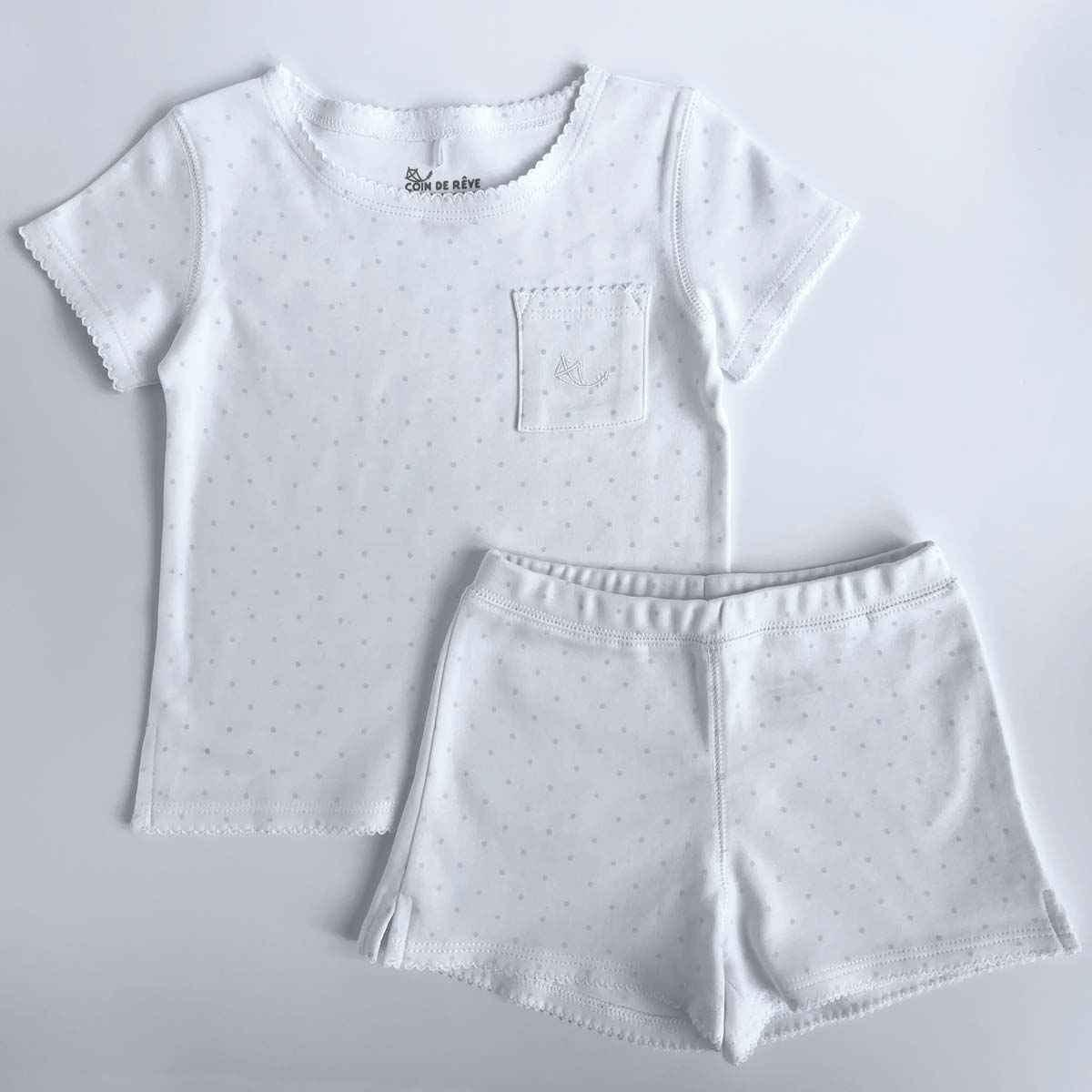 Kort pyjamas för flicka i ekologisk bomull med mintfärgade prickar