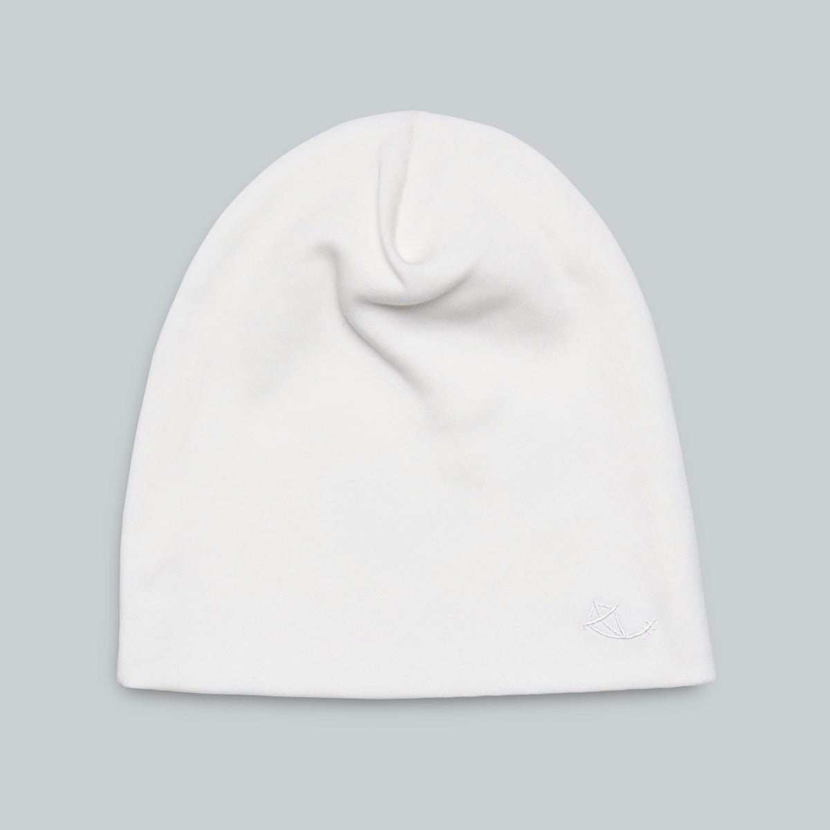 Vit mössa för baby i mjuk ekologisk pimabomull