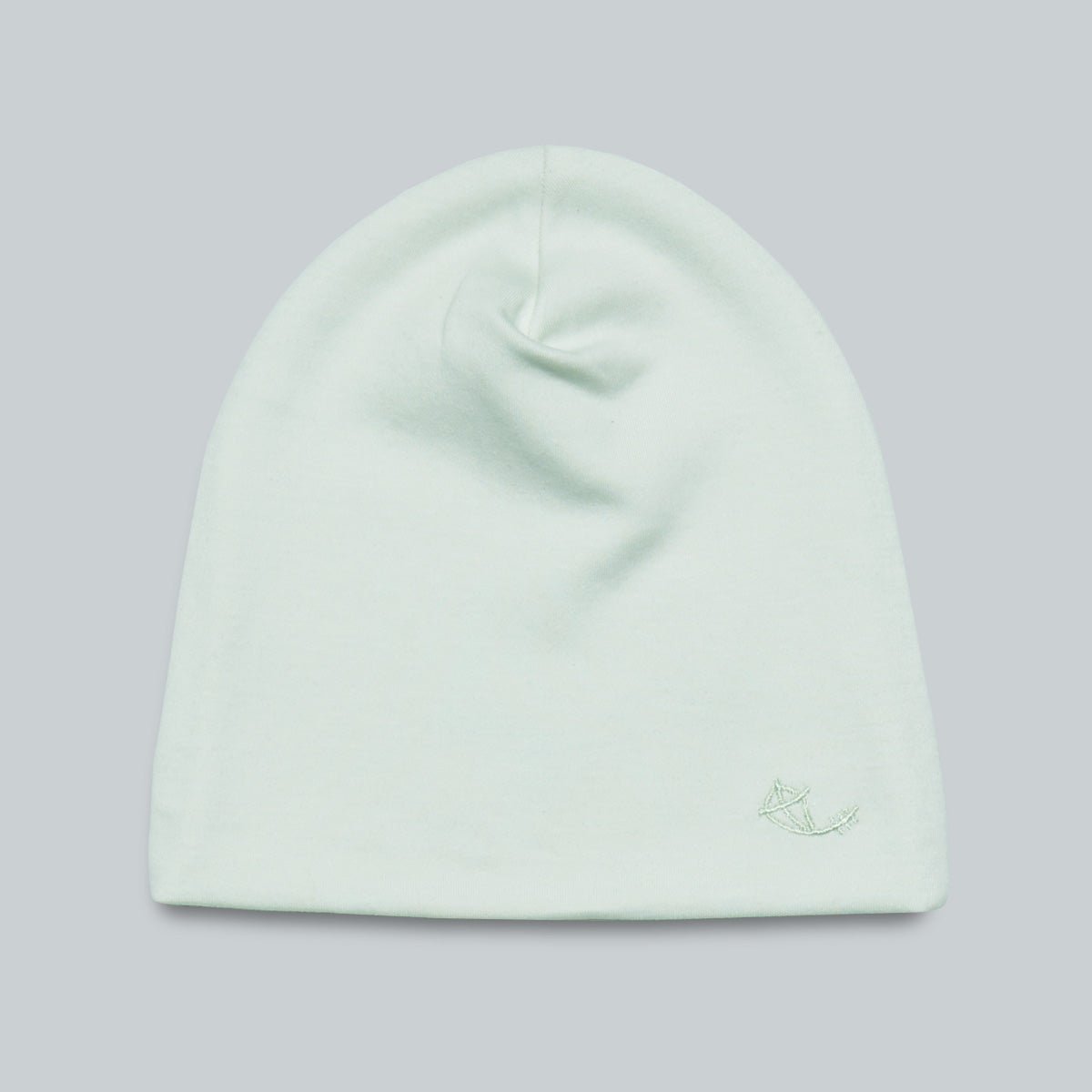 Mintfärgad mössa för baby i mjuk ekologisk pimabomull